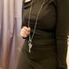 Long beaded necklace with grey faceted beads and dark gold beads