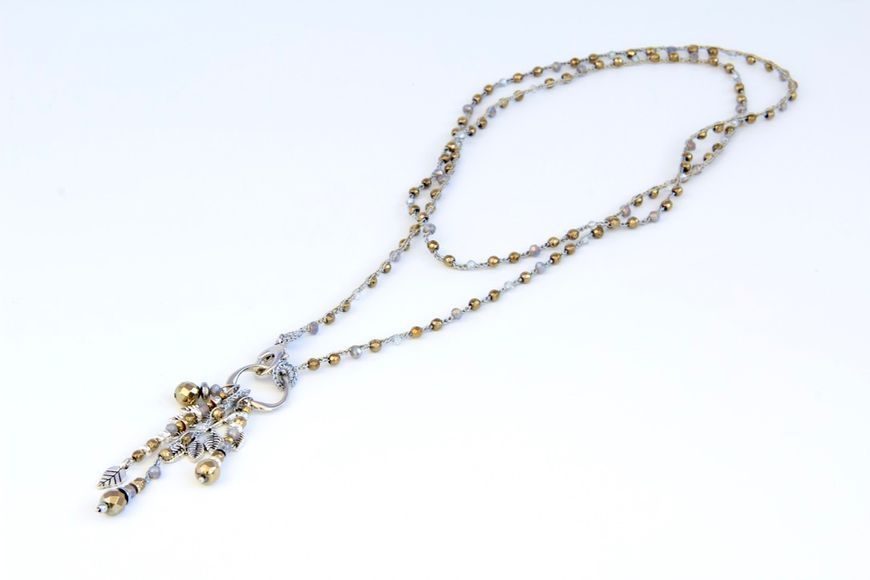 Handmade necklace with silver leaf charms and beaded pendants